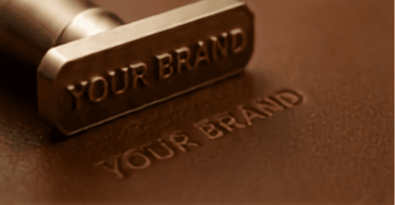 A brand stamp pressed into brown leather